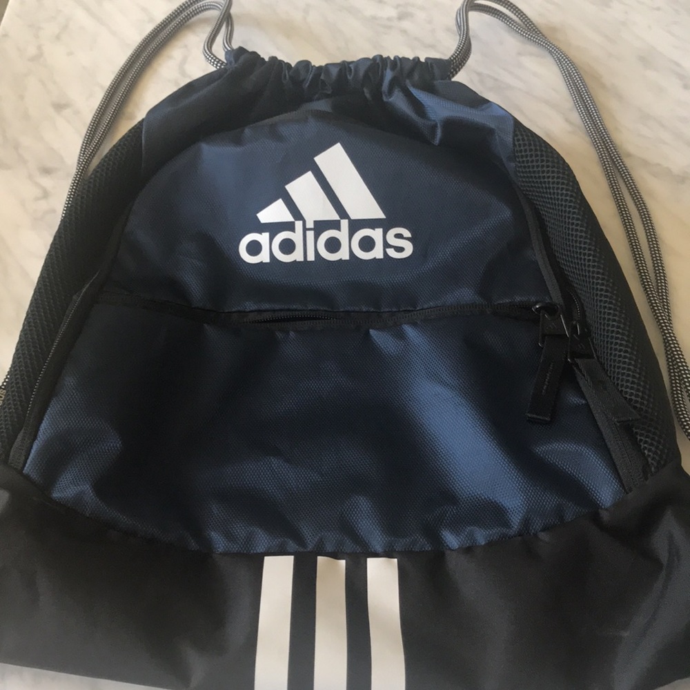 Adidas Sling Backpack, two zip outside and one zip inside